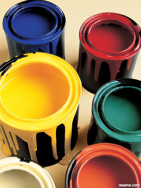 Colourful paint tins
