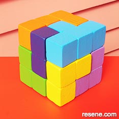 Paint wooden blocks to make a puzzle
