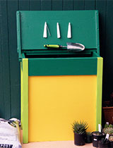 Recycle an old school desk as a storage box for potting mix and gear