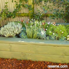 Raised bed with seat