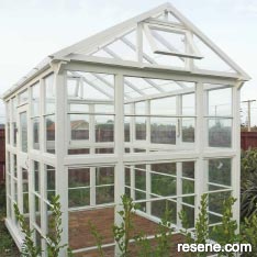 Build a glasshouse out of recycled materials