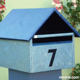 Wooden mailbox transformed with Resene metallic paint