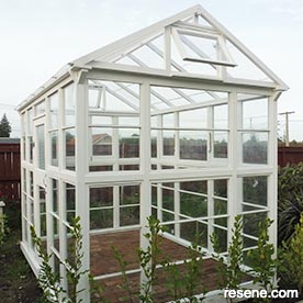 Build a glasshouse out of recycled materials