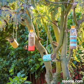 Upcycle containers and jars to make bird feeders for your garden