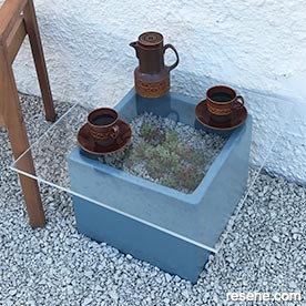 Turn a terracotta pot into an outside coffee table