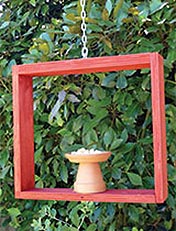 Make a mini bird feeder and paint with Resene totem pole red