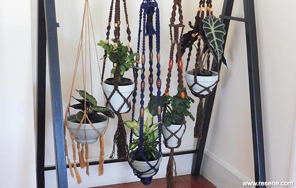 Wooden frame and macrame plant pot hangers
