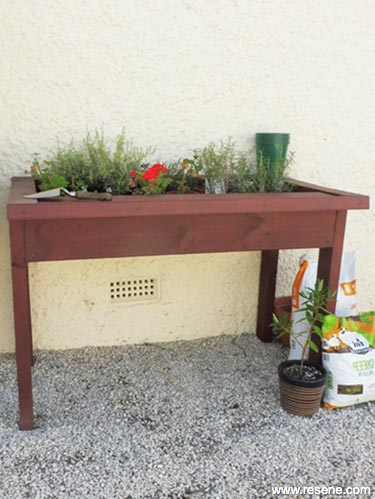 Make a stand up potting bench for your garden
