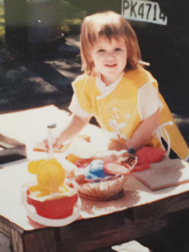 Olivia painting as a child