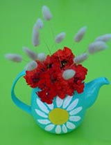 Paint a teapot and turn it into a vase