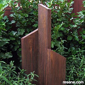 Use Resene Faux rust effect on wood to make a garden sculpture