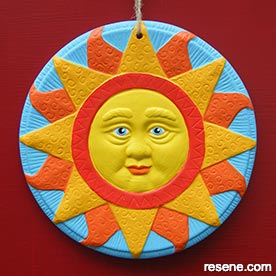 Painted terracotta wall plaque