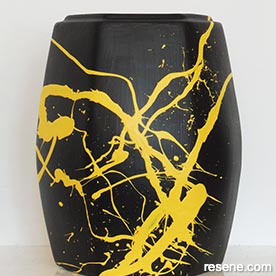 Paint this stylish two-tone splatter vase
