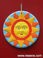 painted terracotta wall plaque
