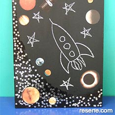 Create a space themed blackboard