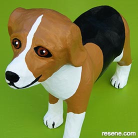 Painted papier mache puppy