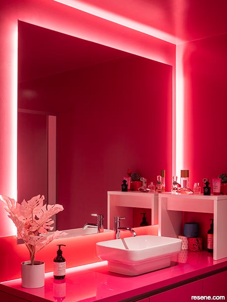 A mood improving magneta pink bathroom
