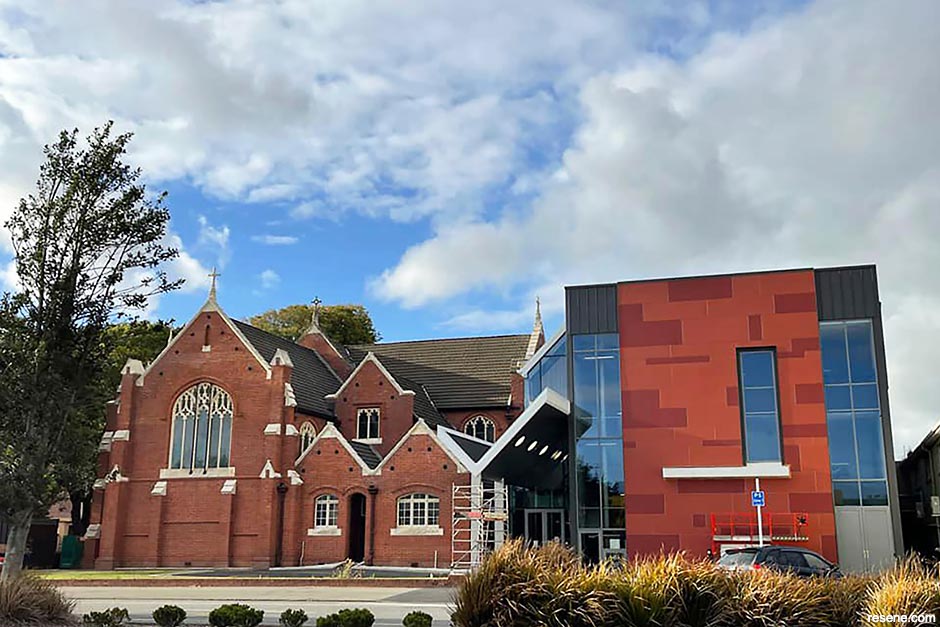 A new school building connected to an historic church