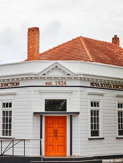 Waipu historical bank with Resene Twisted Sister double doors