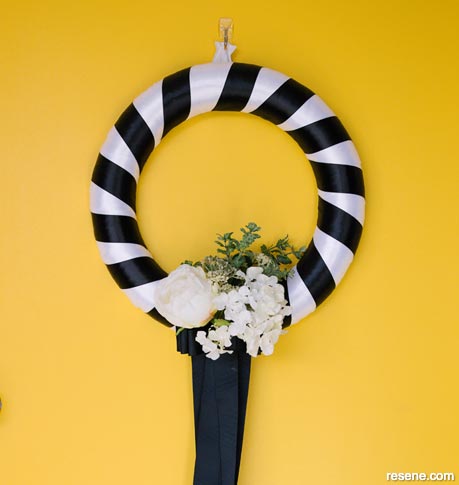 Playful door decor - a vibrant striped wreath