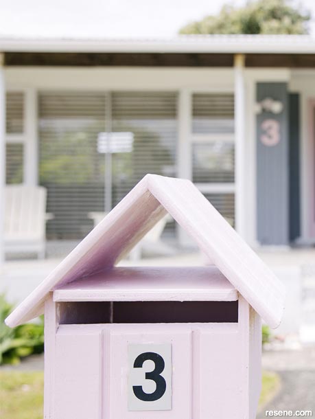 A light pink letterbox in Resene Gelato
