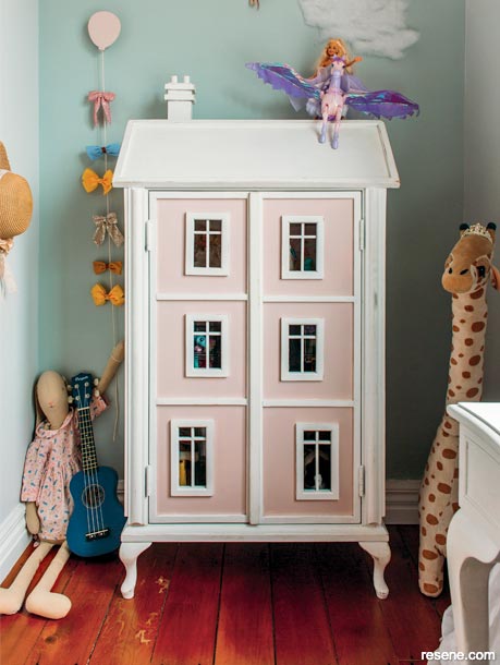 A whimsical dollhouse in Resene Blanched Pink and white
