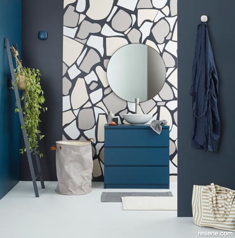 A bathroom with a terrazzo tile effect