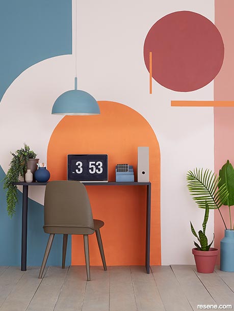 A home office painted in bold colours