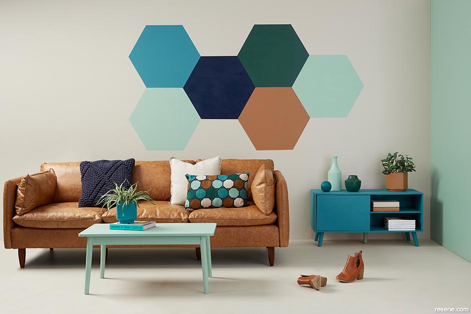 A lounge with hexagonal wall art