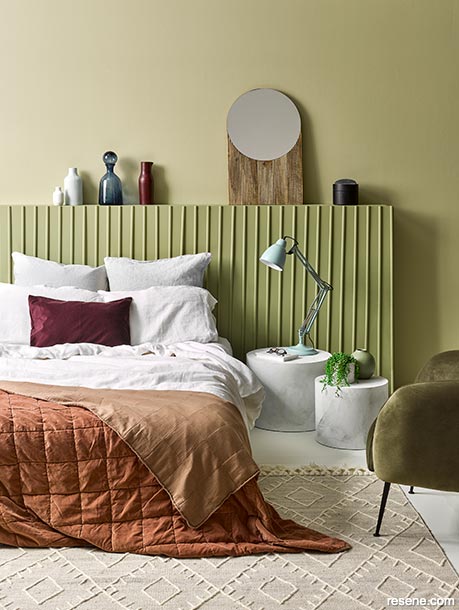 A grounding bedroom painted with earthy hues