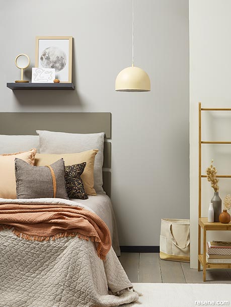 A bedroom with warming earthy neutrals