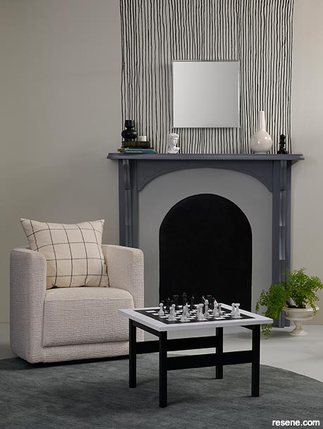 A cosy lounge painted with chalky greys and creams
