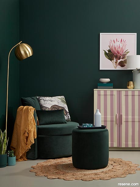 Pink and cream stripes in a dark green lounge