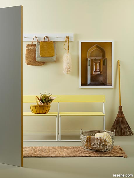 An entryway with a fresh colour palette