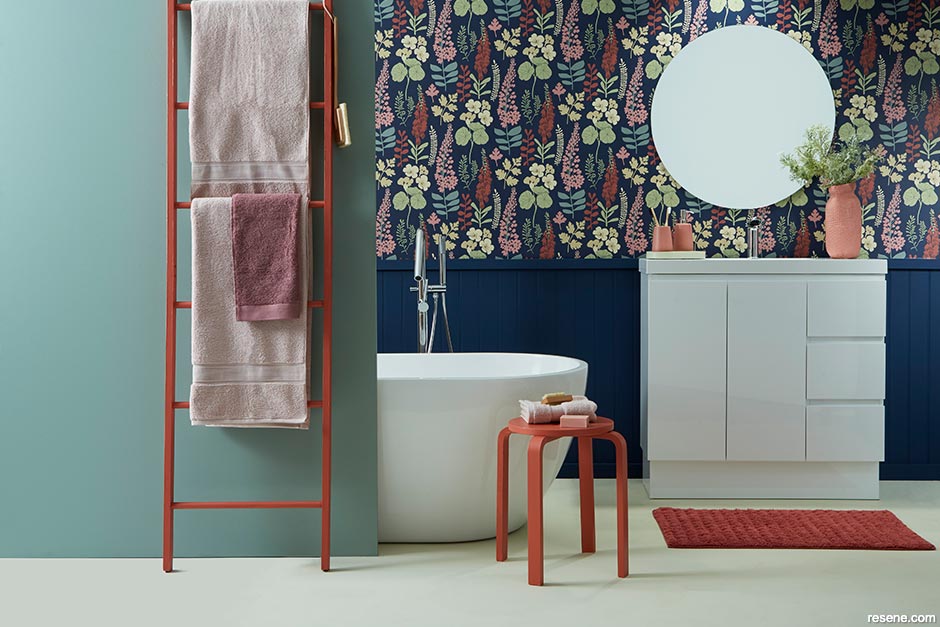 Wallpaper adds drama to this small bathroom
