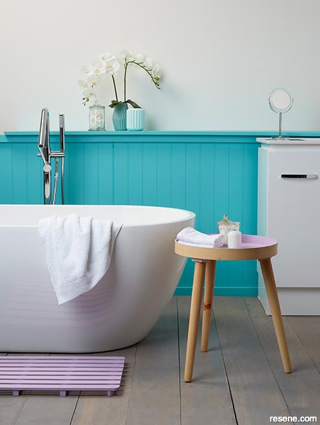 A small blue and white bathroom