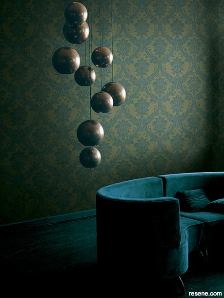 Luxurious wallpaper with muted teal and brass tones