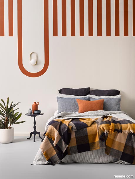 A bedroom with spicy brown hues