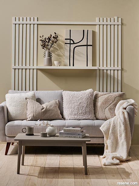 A cosy living room painted with clay-tinted whites
