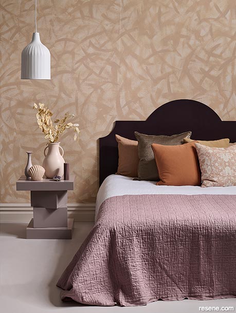 A luxe bedroom with an autumn colour palette
