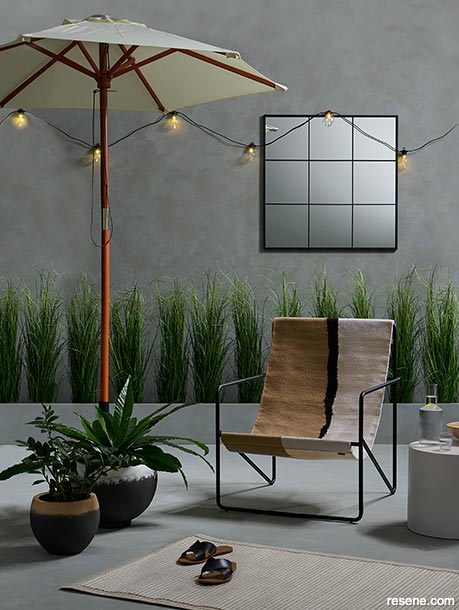 Mirrors can add a sense of space to an outdoor area