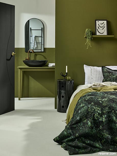 A smouldering and tranquil green master bedroom