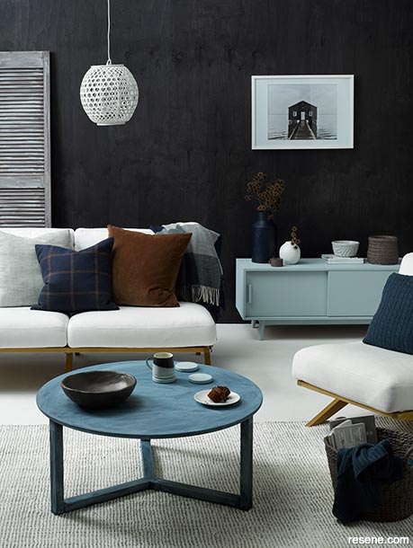 Deep colours and luxurious accessories make this a wintery lounge