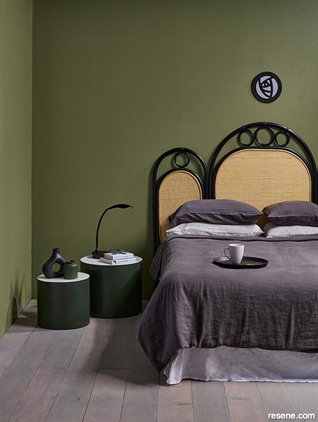 A green Art Nouveau style bedroom