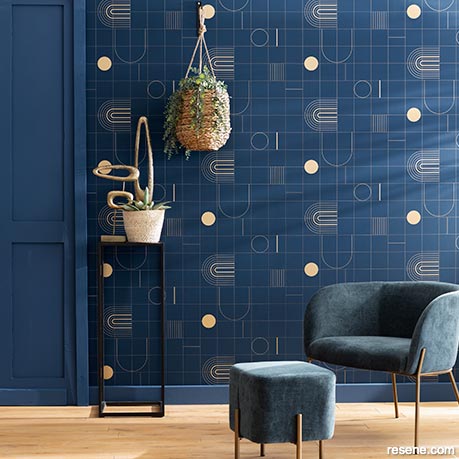 An interior with dramatic blue wallpaper