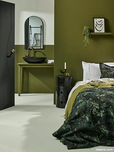 A rich green and charcoal bedroom and ensuite