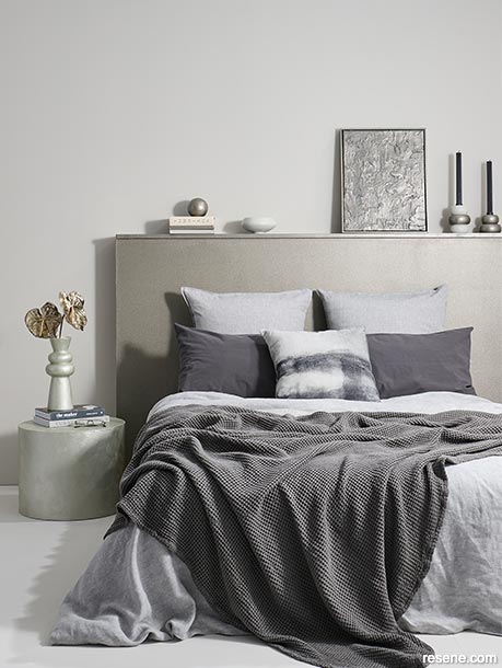 A bedroom with a metallic paint finish