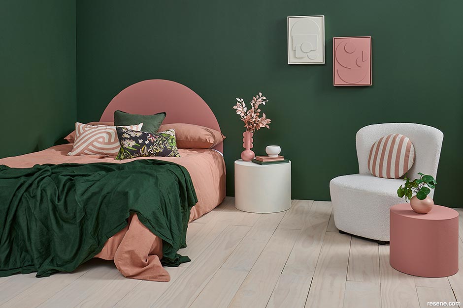A forest green and pink bedroom