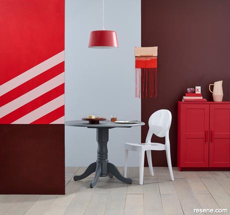 A red dining room tempered with cooling grey-blues 