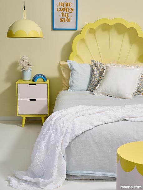 An uplifting bedroom painted in sweet citrusy yellows